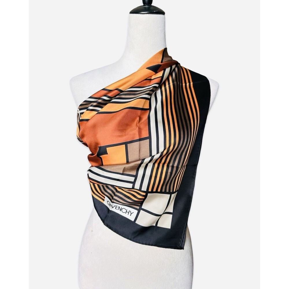 Givenchy silk twill scarf with a geometric orange and black pattern
